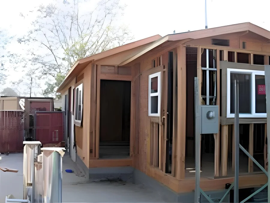 Ready for Utilities &mdash; A compact structure framed and ready for MEP rough-in.
