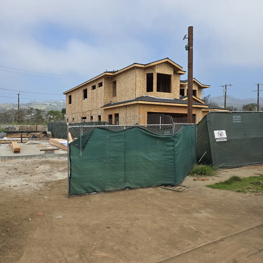 Foundation to Frame &mdash; A poured foundation and structural frame on a new build.