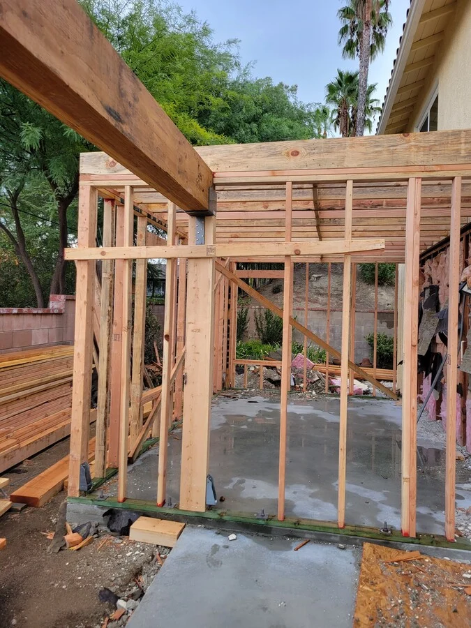 Structural Detail &mdash; Post-and-beam connections, engineered and inspected.