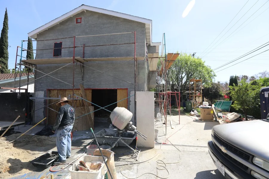 Lath & Stucco &mdash; Exterior finishes applied over a completed frame.