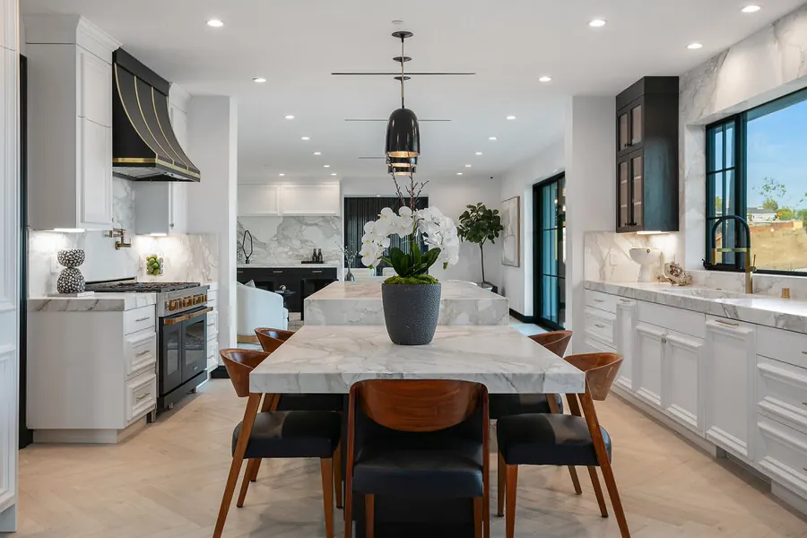 Savona kitchen with marble island and dining table