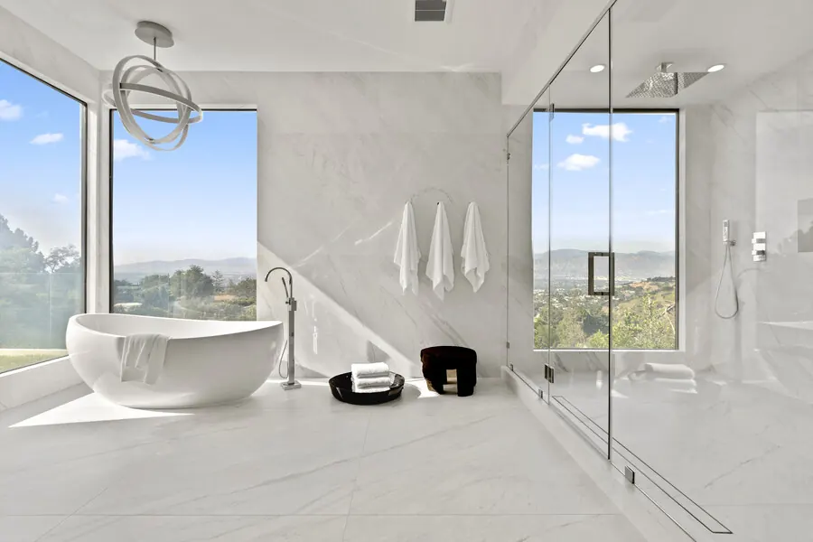 Skyline primary bath with sculptural freestanding tub
