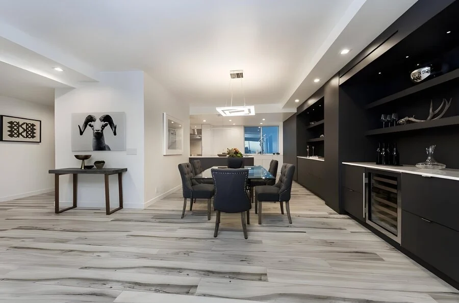 Dining & Bar &mdash; Black cabinetry and open shelving beside the table.
