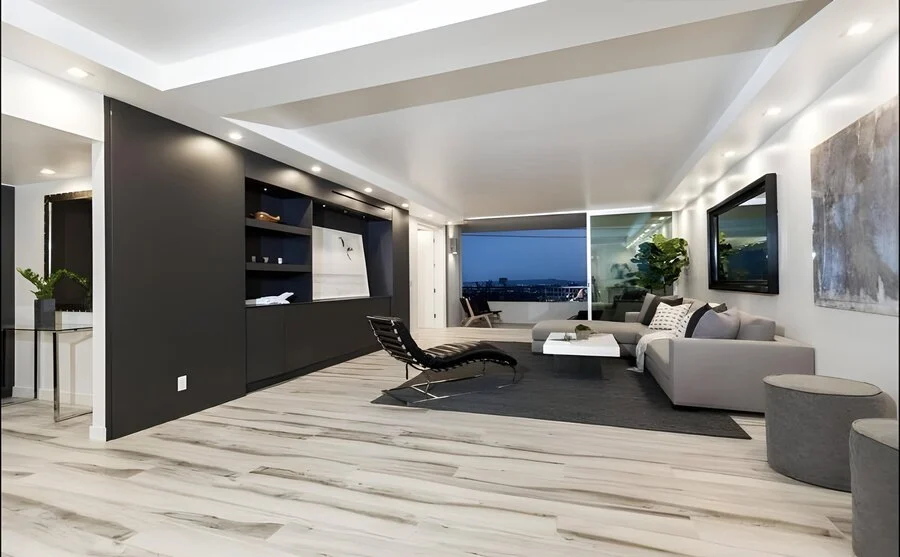 Living Room, Black Wall &mdash; A sculptural accent wall against the evening skyline.