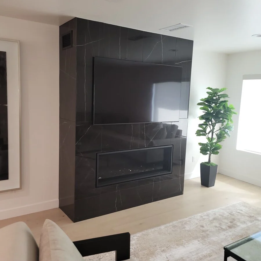 Media Wall &mdash; A built-in fireplace surround with integrated shelving.