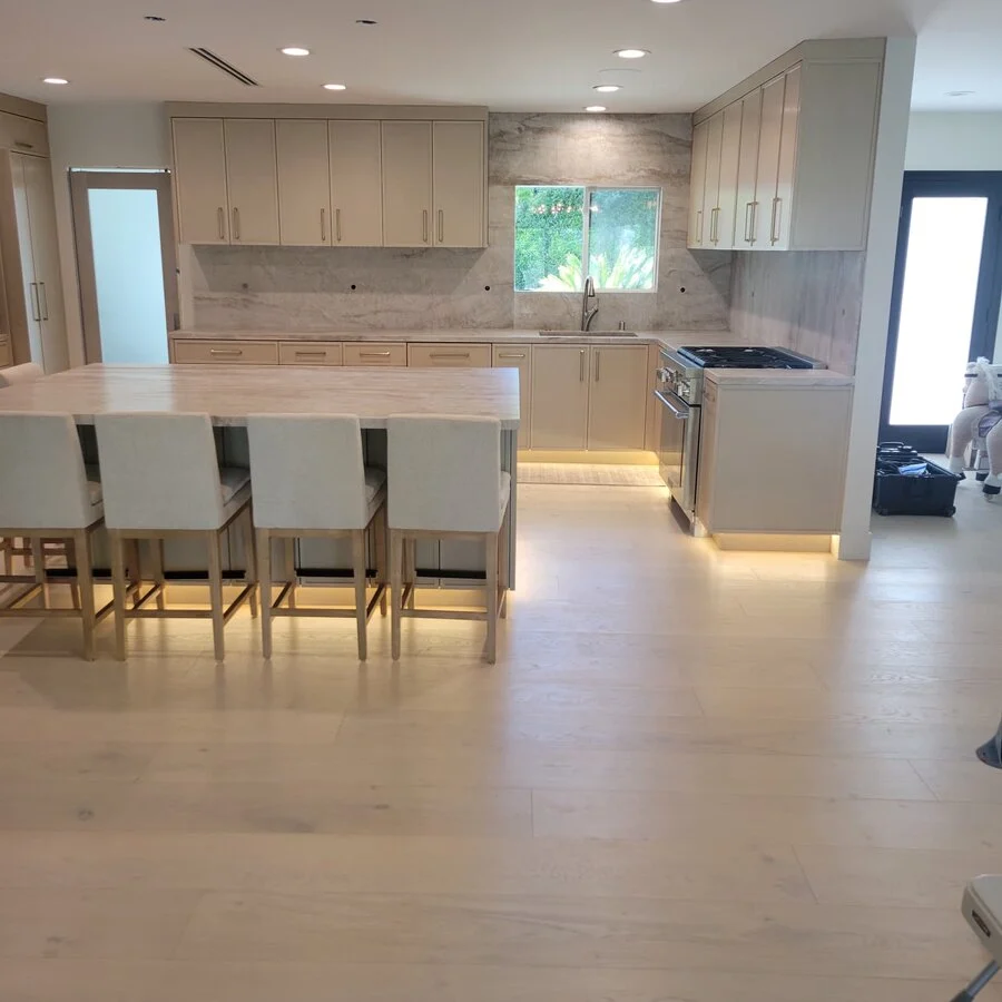 Open to Living &mdash; A long island seating six, open to the living room.