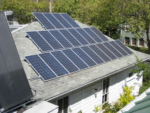 Integrated Solar &mdash; A solar array set flush into a composition roof.