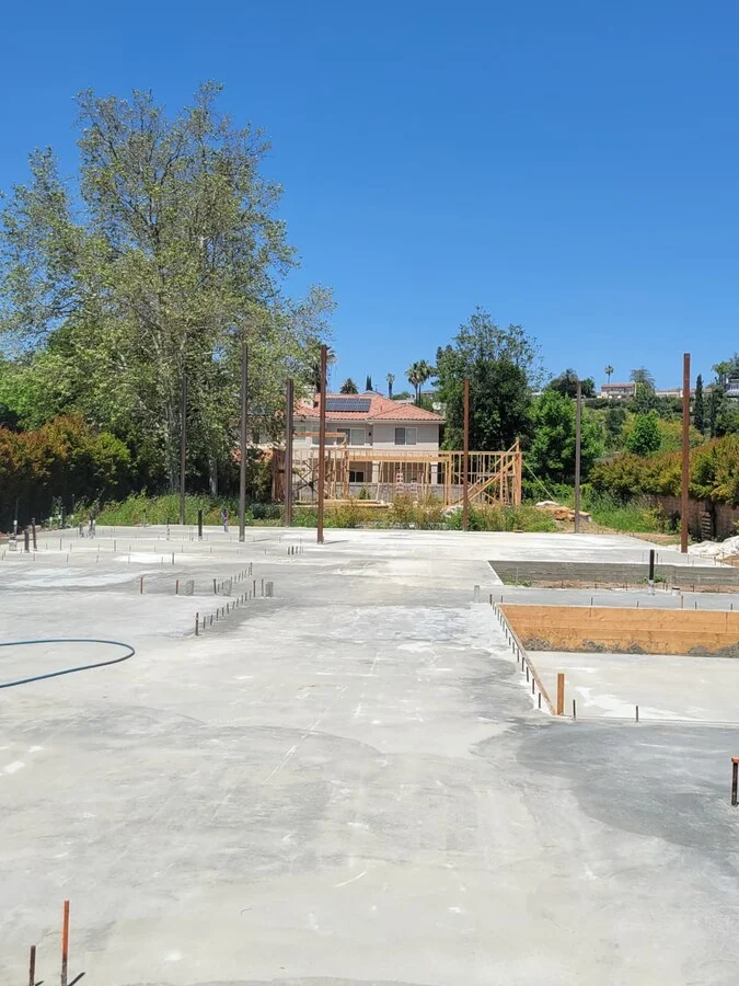 Foundation Poured &mdash; Slab and footings set for the new structure.