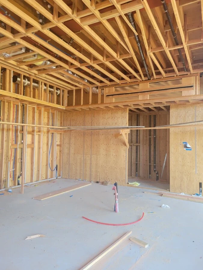 Rough Framing &mdash; Interior stud walls laid out and squared.